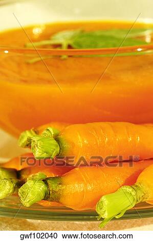 Close-up of a bowl of carrot soup View Large Photo Image Stock Image - Close-up of a bowl of carrot soup. Fotosearch