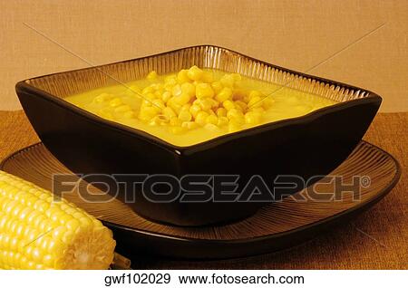 Close-up of a bowl of corn soup View Large Photo Image Stock Photo - Close-up of a bowl of corn soup. Fotosearch