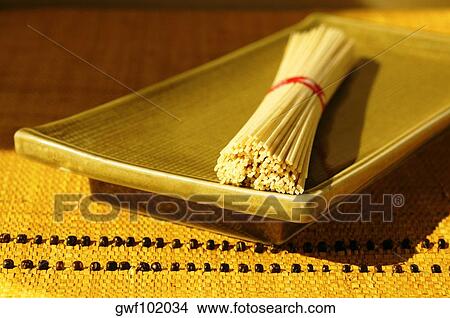 Close-up of a bundle of raw spaghetti View Large Photo Image Picture - Close-up of a bundle of raw spaghetti. Fotosearch