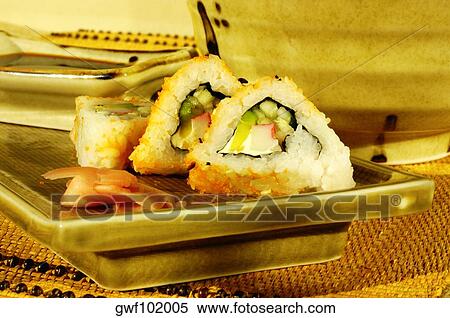 Close-up of sushi with soy sauce on a serving tray View Large Photo Image Stock Photography - Close-up of sushi with soy sauce on a serving tray. Fotosearch