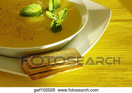 High angle view of a bowl of soup and crackers View Large Photo Image Stock Photograph - High angle view of a bowl of soup and crackers. Fotosearch