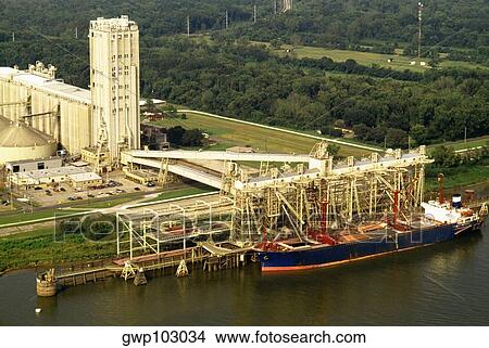 Aerial view of a container ship being loaded with grains at a terminal, New Orleans, Louisiana, USA View Large Photo Image Picture - Aerial view of a container ship being loaded with grains at a terminal, New Orleans, Louisiana, USA. Fotosearch