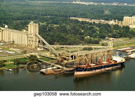Aerial view of container ships being loaded with grain, Mississippi River, New Orleans, Louisiana, USA View Large Photo Image Stock Photo - Aerial view of container ships being loaded with grain, Mississippi River, New Orleans, Louisiana, USA. Fotosearch
