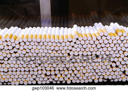 Close-up of cigarettes on an assembly line at a factory, Phillip Morris Factory, Richmond, Virginia, USA View Large Photo Image Stock Photograph - Close-up of cigarettes on an assembly line at a factory, Phillip Morris Factory, Richmond, Virginia, USA. Fotosearch