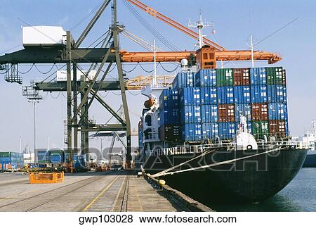 Container ship and cranes at a dock, Los Angeles, USA View Large Photo Image Stock Photo - Container ship and cranes at a dock, Los Angeles, USA. Fotosearch