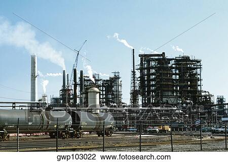 Freight train in front of a chemical plant, Chicago, Illinois, USA View Large Photo Image Stock Image - Freight train in front of a chemical plant, Chicago, Illinois, USA. Fotosearch