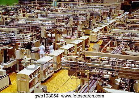 High angle view of manual workers working in a cigarette factory, Richmond, Virginia, USA View Large Photo Image Picture - High angle view of manual workers working in a cigarette factory, Richmond, Virginia, USA. Fotosearch