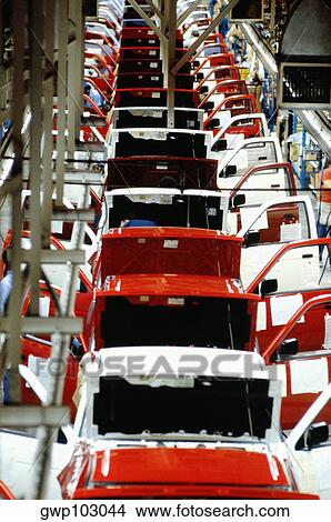 High angle view of manufactured cars on an assembly line in a factory, Smyrna, Tennessee, USA View Large Photo Image Picture - High angle view of manufactured cars on an assembly line in a factory, Smyrna, Tennessee, USA. Fotosearch