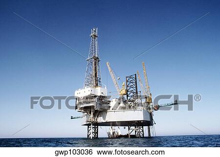 Offshore oil drilling rig View Large Photo Image Stock Photograph - Offshore oil drilling rig. Fotosearch