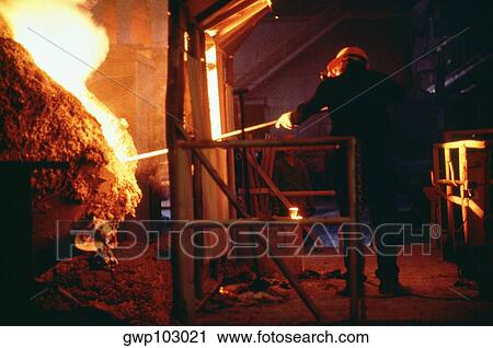 Rear view of a manual worker working in a steel mill View Large Photo Image Stock Image - Rear view of a manual worker working in a steel mill. Fotosearch
