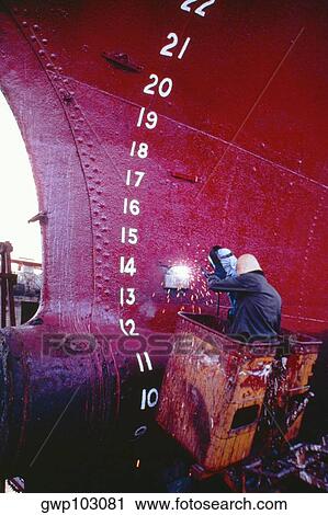 Rear view of a welder welding a tanker, Cebu, Philippines View Large Photo Image Stock Image - Rear view of a welder welding a tanker, Cebu, Philippines. Fotosearch
