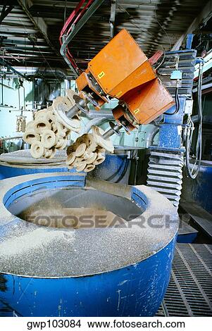 Robots being used to mold plastics View Large Photo Image Picture - Robots being used to mold plastics. Fotosearch