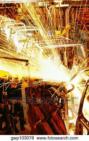 Robots welding automobile van bodies on an assembly line, Baltimore, Maryland, USA View Large Photo Image Stock Photo - Robots welding automobile van bodies on an assembly line, Baltimore, Maryland, USA. Fotosearch