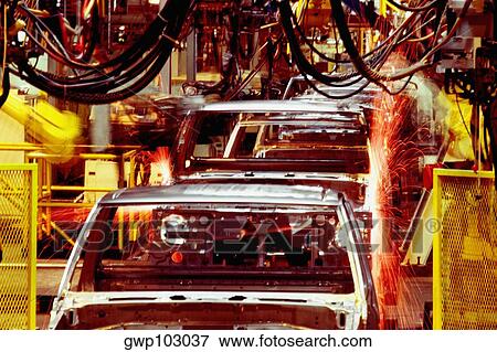 Robots welding cars in a factory, Smyrna, Georgia, USA View Large Photo Image Stock Photo - Robots welding cars in a factory, Smyrna, Georgia, USA. Fotosearch