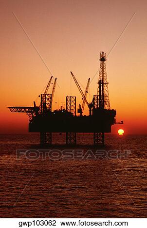 Silhouette of an oil drilling rig at dusk, Mediterranean Sea, Tunisia View Large Photo Image Stock Image - Silhouette of an oil drilling rig at dusk, Mediterranean Sea, Tunisia. Fotosearch