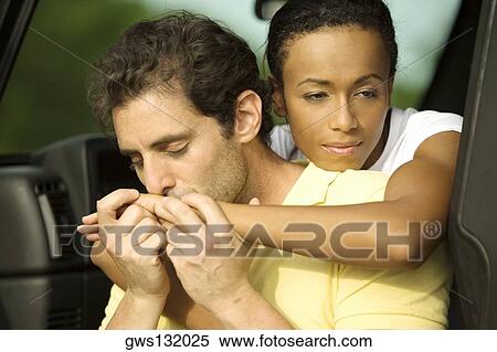 Close-up of a mid adult man kissing a young woman's hand View Large Photo Image Stock Photography - Close-up of a mid adult man kissing a young woman's hand. Fotosearch