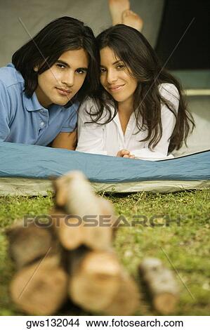 Picture - Portrait of a young couple smiling. Fotosearch