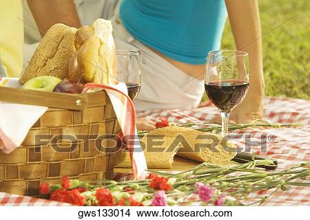 Picture - Close-up of two glasses of wine with buns. Fotosearch