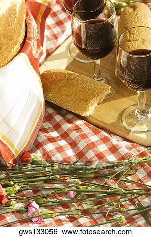 High angle view of wineglasses with bread on a tray View Large Photo Image Stock Photograph - High angle view of wineglasses with bread on a tray. Fotosearch