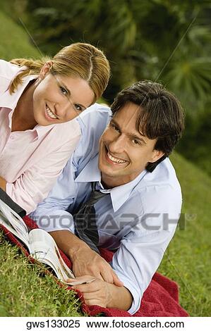 Portrait of a businessman and a businesswoman smiling View Large Photo Image Stock Photography - Portrait of a businessman and a businesswoman smiling. Fotosearch