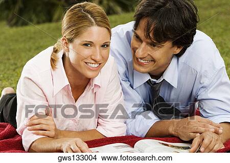 Portrait of a businesswoman and a businessman smiling View Large Photo Image Picture - Portrait of a businesswoman and a businessman smiling. Fotosearch