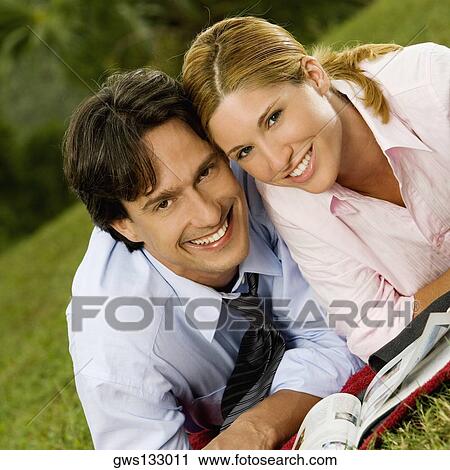 Portrait of a businesswoman and a businessman smiling View Large Photo Image Stock Image - Portrait of a businesswoman and a businessman smiling. Fotosearch