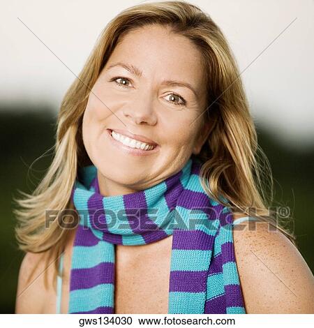 Portrait of a mature woman smiling View Large Photo Image Stock Image - Portrait of a mature woman smiling. Fotosearch