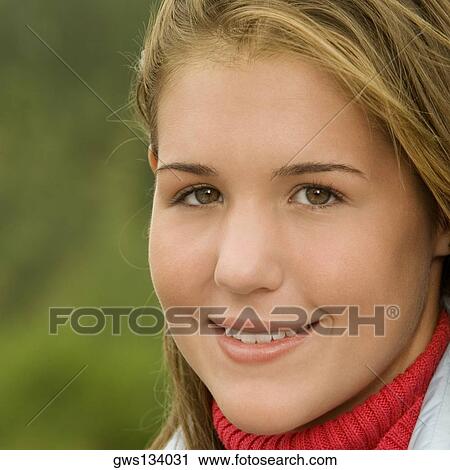 Portrait of a teenage girl smiling View Large Photo Image Stock Image - Portrait of a teenage girl smiling. Fotosearch