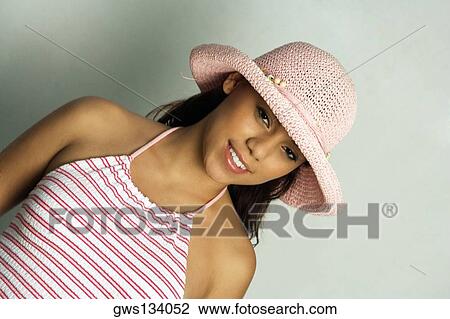 Portrait of a teenage girl smiling View Large Photo Image Stock Image - Portrait of a teenage girl smiling. Fotosearch