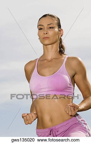 Close-up of a mid adult woman making a fist View Large Photo Image Stock Image - Close-up of a mid adult woman making a fist. Fotosearch