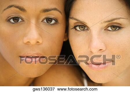 Portrait of two young women View Large Photo Image Stock Photo - Portrait of two young women. Fotosearch