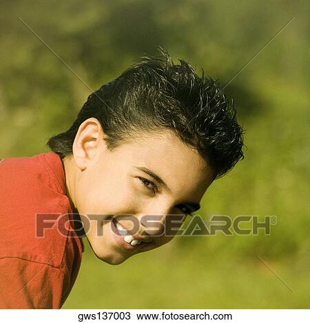 Portrait of a boy smiling View Large Photo Image Stock Image - Portrait of a boy smiling. Fotosearch