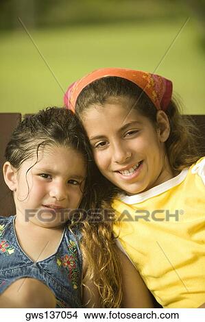 Picture - Portrait of two girls smiling. Fotosearch