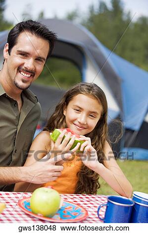 Portrait of a father and his daughter smiling View Large Photo Image Stock Photo - Portrait of a father and his daughter smiling. Fotosearch