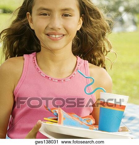 Portrait of a girl with plates and a disposable cup View Large Photo Image Stock Image - Portrait of a girl with plates and a disposable cup. Fotosearch