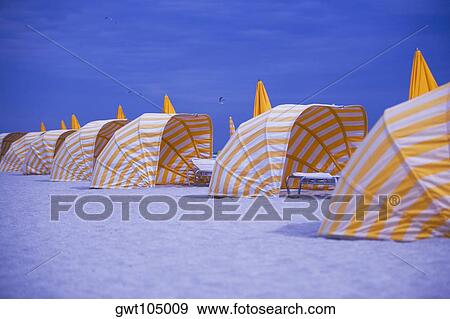 Canopies in a row on the beach, Miami, Florida, USA View Large Photo Image Stock Photo - Canopies in a row on the beach, Miami, Florida, USA. Fotosearch