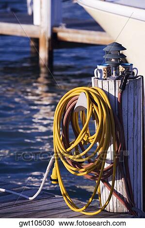 Close-up of a hose on the dock, Miami, Florida, USA View Large Photo Image Stock Image - Close-up of a hose on the dock, Miami, Florida, USA. Fotosearch