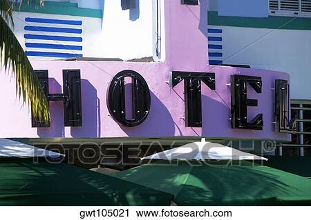 Stock Image - Close-up of a hotel sign on a building, Miami, Florida, USA. Fotosearch