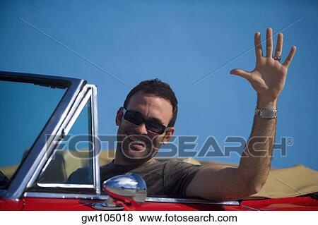 Close-up of a mid adult man waving his hand View Large Photo Image Stock Photo - Close-up of a mid adult man waving his hand. Fotosearch