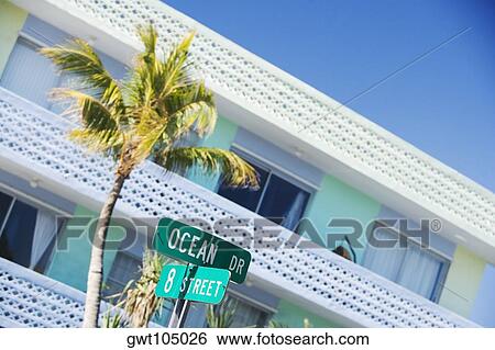 Close-up of a street name sign in front of a building, Miami, Florida, USA View Large Photo Image Stock Photograph - Close-up of a street name sign in front of a building, Miami, Florida, USA. Fotosearch