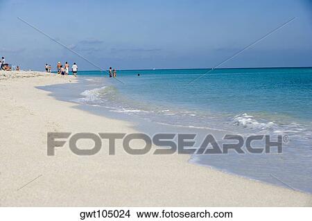 Picture - Group of a people on the beach, Miami, Florida, USA. Fotosearch