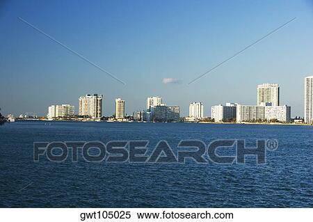 Panoramic view of buildings along the sea, Miami, Florida, USA View Large Photo Image Stock Photography - Panoramic view of buildings along the sea, Miami, Florida, USA. Fotosearch