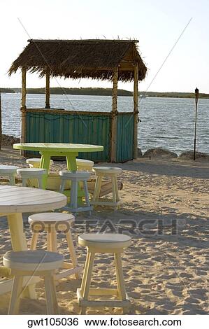 Table and chairs on the beach, Miami, Florida, USA View Large Photo Image Stock Photograph - Table and chairs on the beach, Miami, Florida, USA. Fotosearch