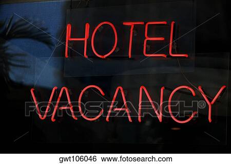 Stock Photograph - Close-up of a neon sign on a store window, Miami, Florida, USA. Fotosearch