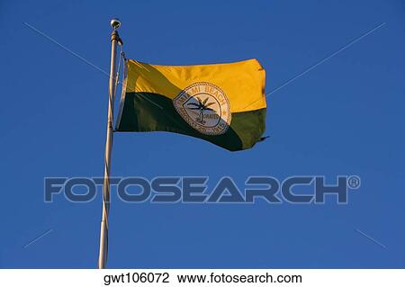 Low angle view of a flag fluttering, Miami, Florida, USA View Large Photo Image Stock Image - Low angle view of a flag fluttering, Miami, Florida, USA. Fotosearch