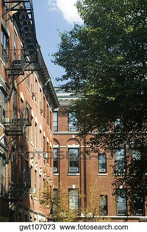 Stock Image - Low angle view of a fire escape on a building, Boston, Massachusetts, USA. Fotosearch