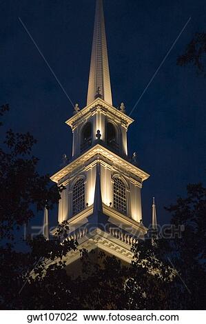 Stock Image - Low angle view of a tower lit up at night, Boston, Massachusetts, USA. Fotosearch