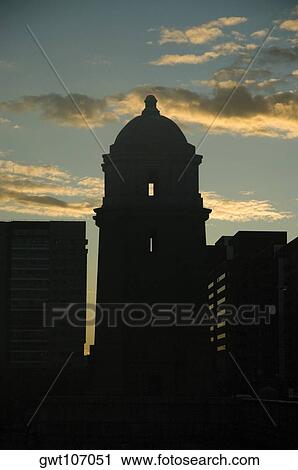 Stock Image - Silhouette of buildings at night, Boston, Massachusetts, USA. Fotosearch