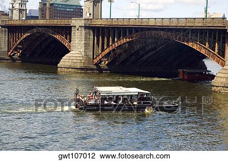 Tourist in a streamer near an arch bridge, Boston, Massachusetts, USA View Large Photo Image Stock Image - Tourist in a streamer near an arch bridge, Boston, Massachusetts, USA. Fotosearch