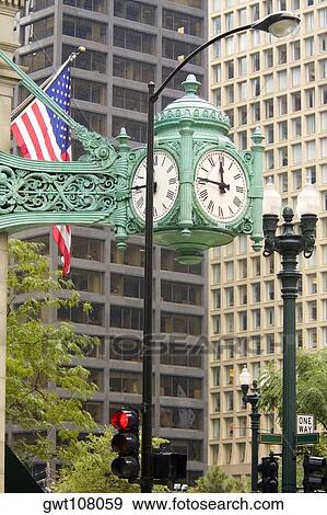 Low angle view of a clock, Chicago, Illinois, USA View Large Photo Image Stock Photo - Low angle view of a clock, Chicago, Illinois, USA. Fotosearch